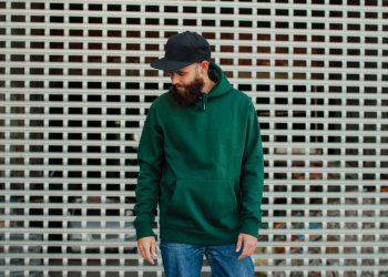 man wearing a green hoodie